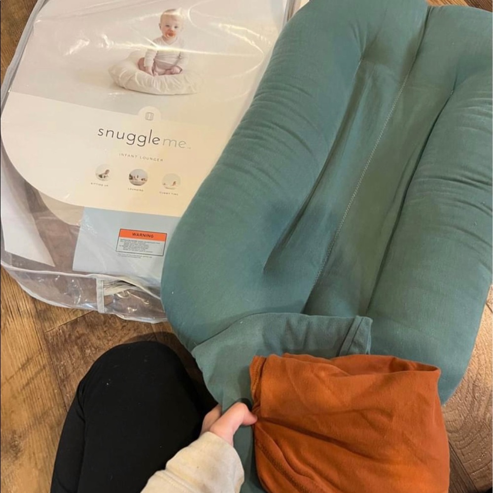 Snuggle me Infant lounger 2 covers